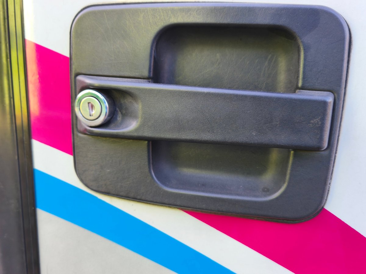 Deadlock fitted to commercial van door handle mechanism
